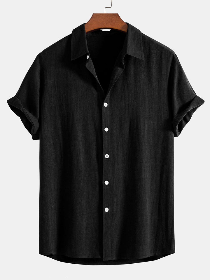 Classic black short sleeve button-down shirt with front button details