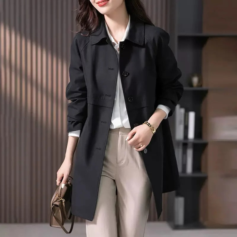 Classic dark blue button-front mid-length trench coat for women, stylish outerwear fashion.