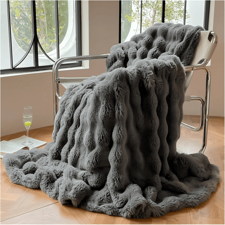Lightweight cozy blanket styled on a bed for everyday comfort and style.