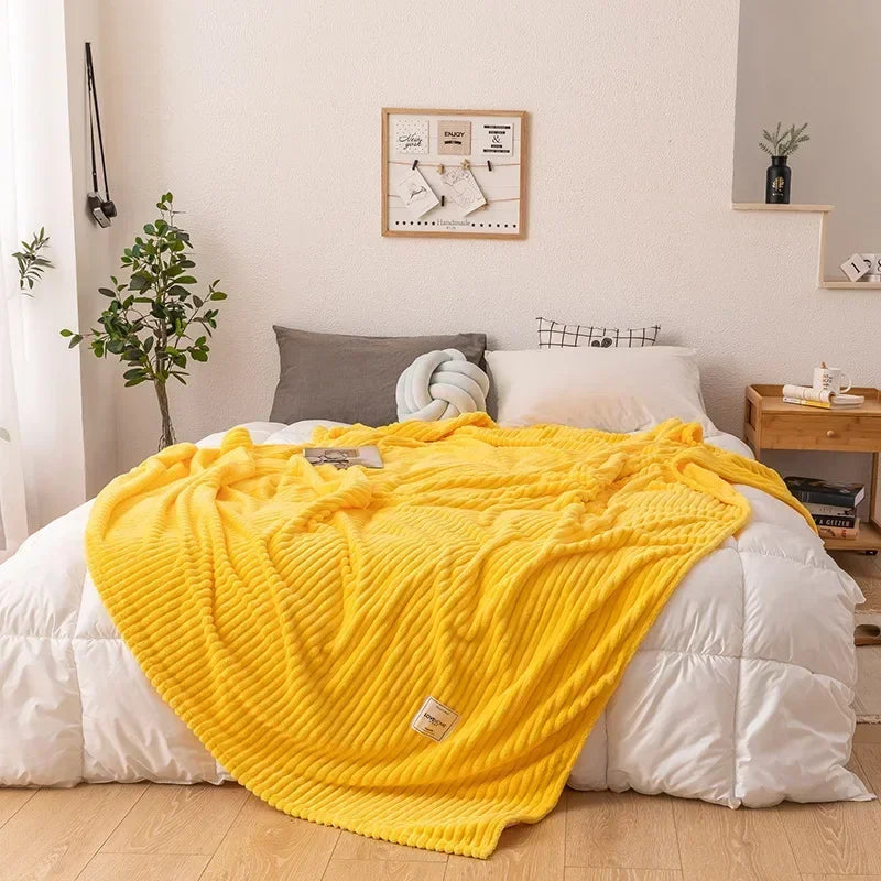 Unisex thick flannel autumn blanket folded neatly to show plush texture and soft fabric