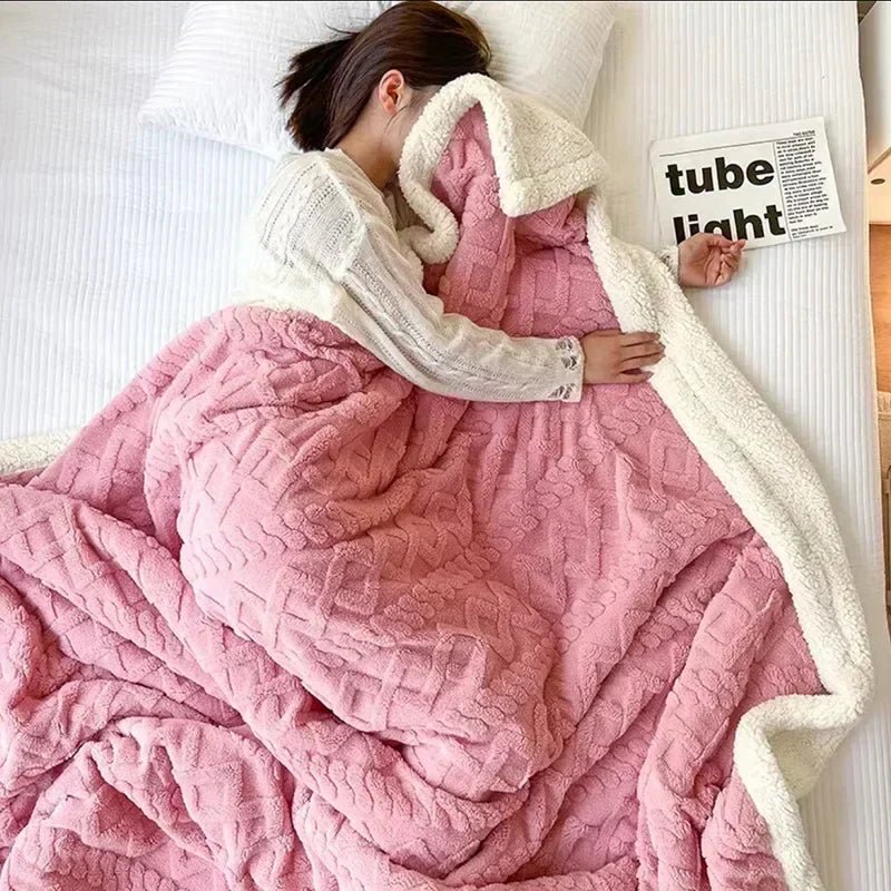 Soft winter fluffy blanket spread across a bed for cold season comfort