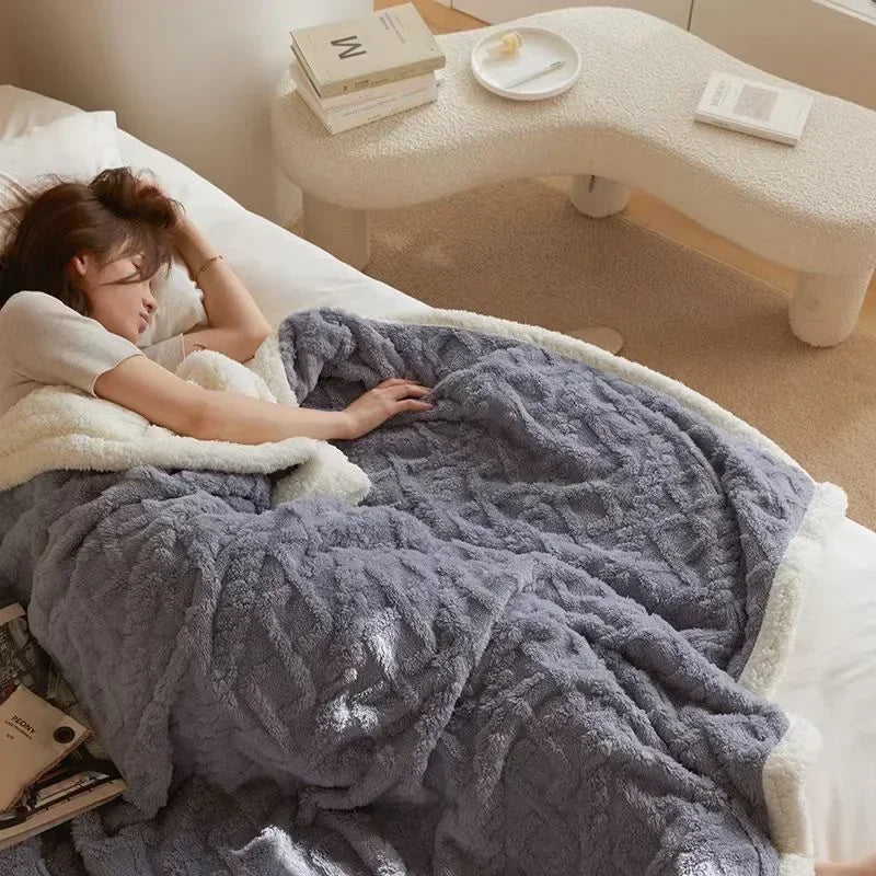 Cozy warm winter blanket draped over a modern bed for bedroom decor