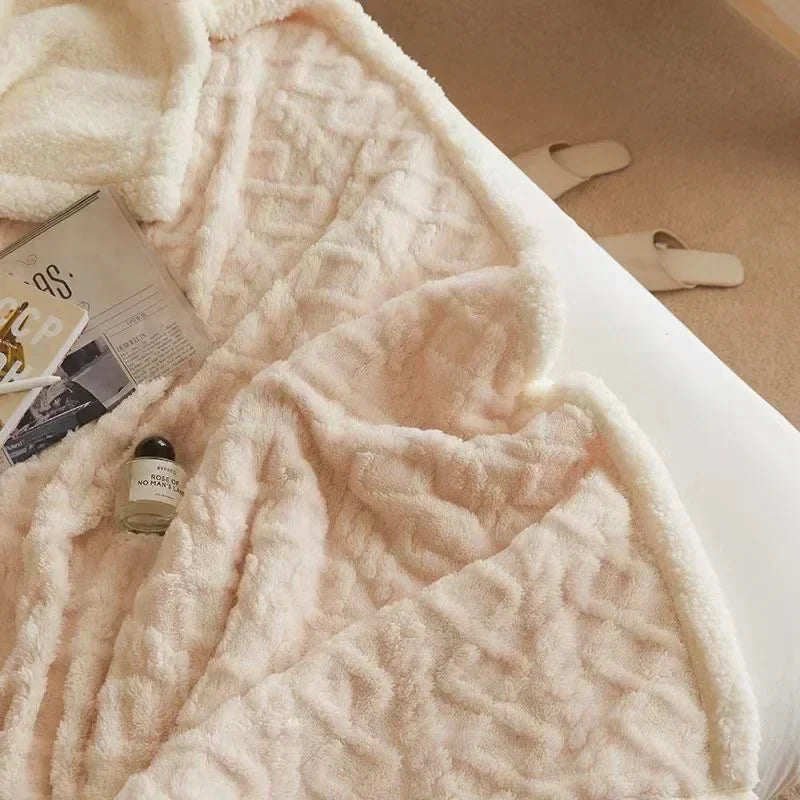 Close-up view of thick fluffy blanket fabric showing extreme softness