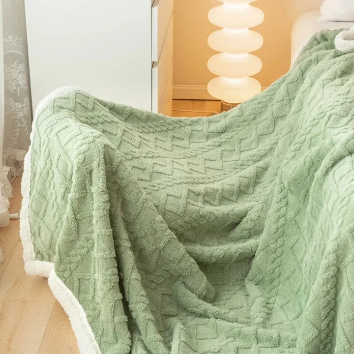 Aesthetic living room setup with folded jacquard sherpa blanket ready for use