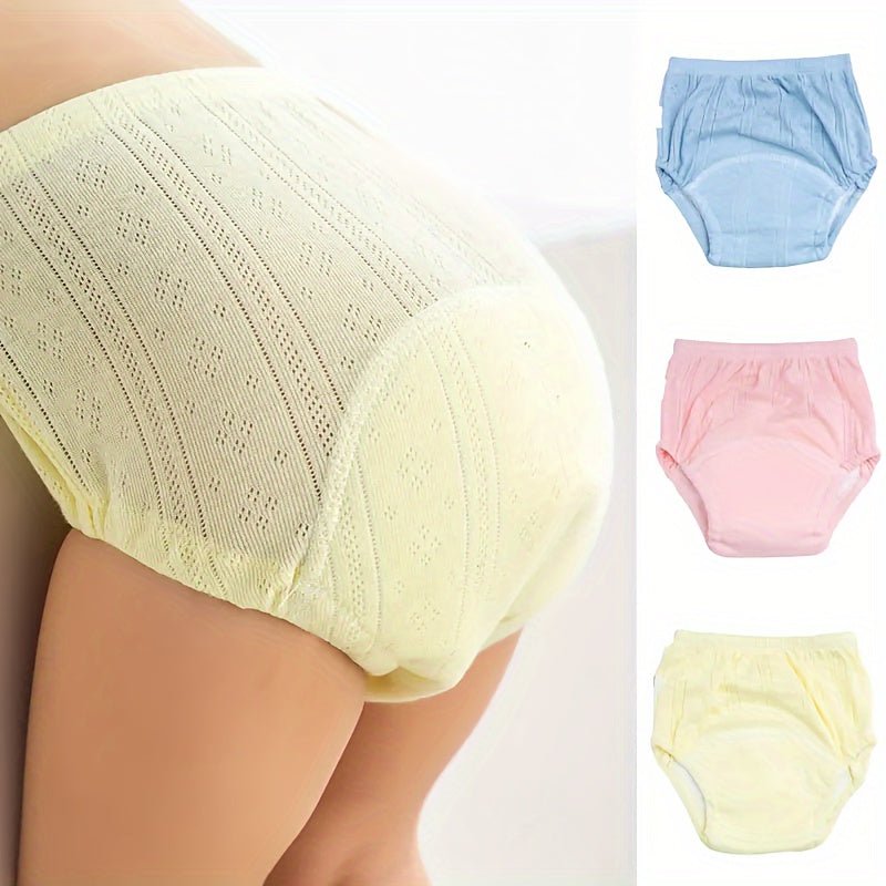 Close-up of a yellow toddler training pant worn by a child, showing the flexible stretch waistband.