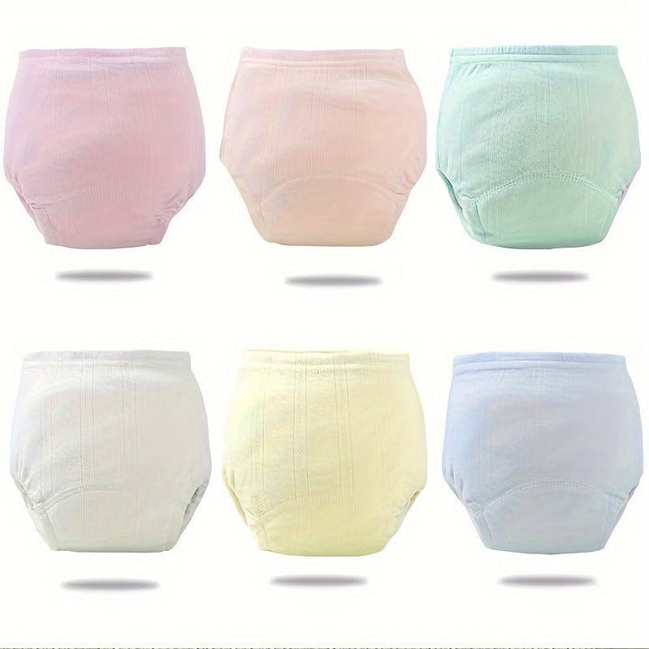 Assorted colors of toddler potty training pants featuring leakproof lining and soft breathable fabric.