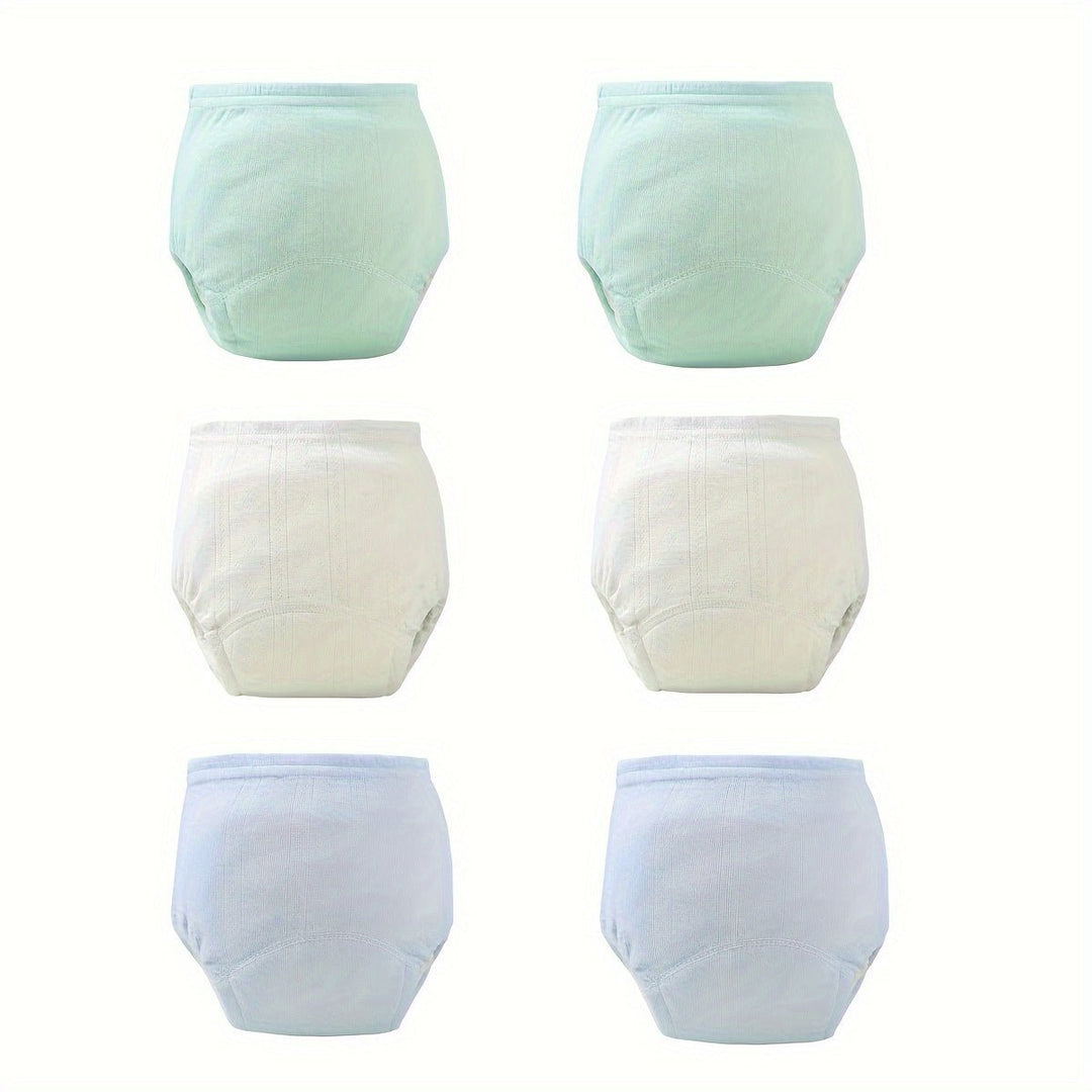 Stack of colorful washable training pants for toddlers ready for daily wear