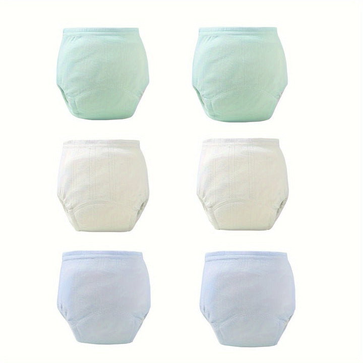 Stack of colorful washable training pants for toddlers ready for daily wear