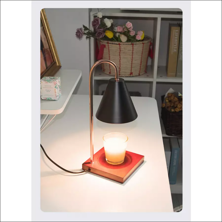Decorative table lamp functioning as a smoke-free candle warmer device