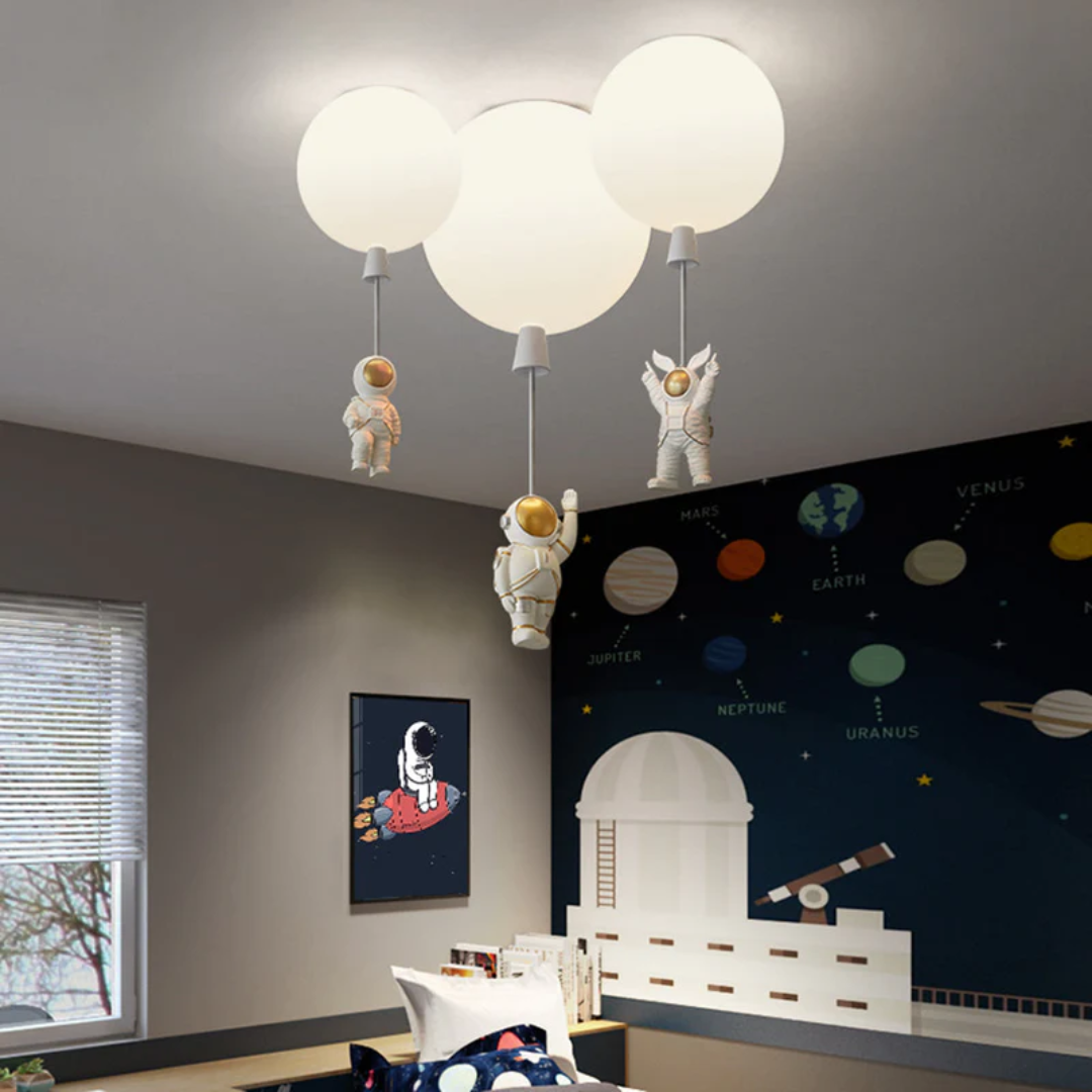 Kids room astronaut LED ceiling lamp with moon design glowing