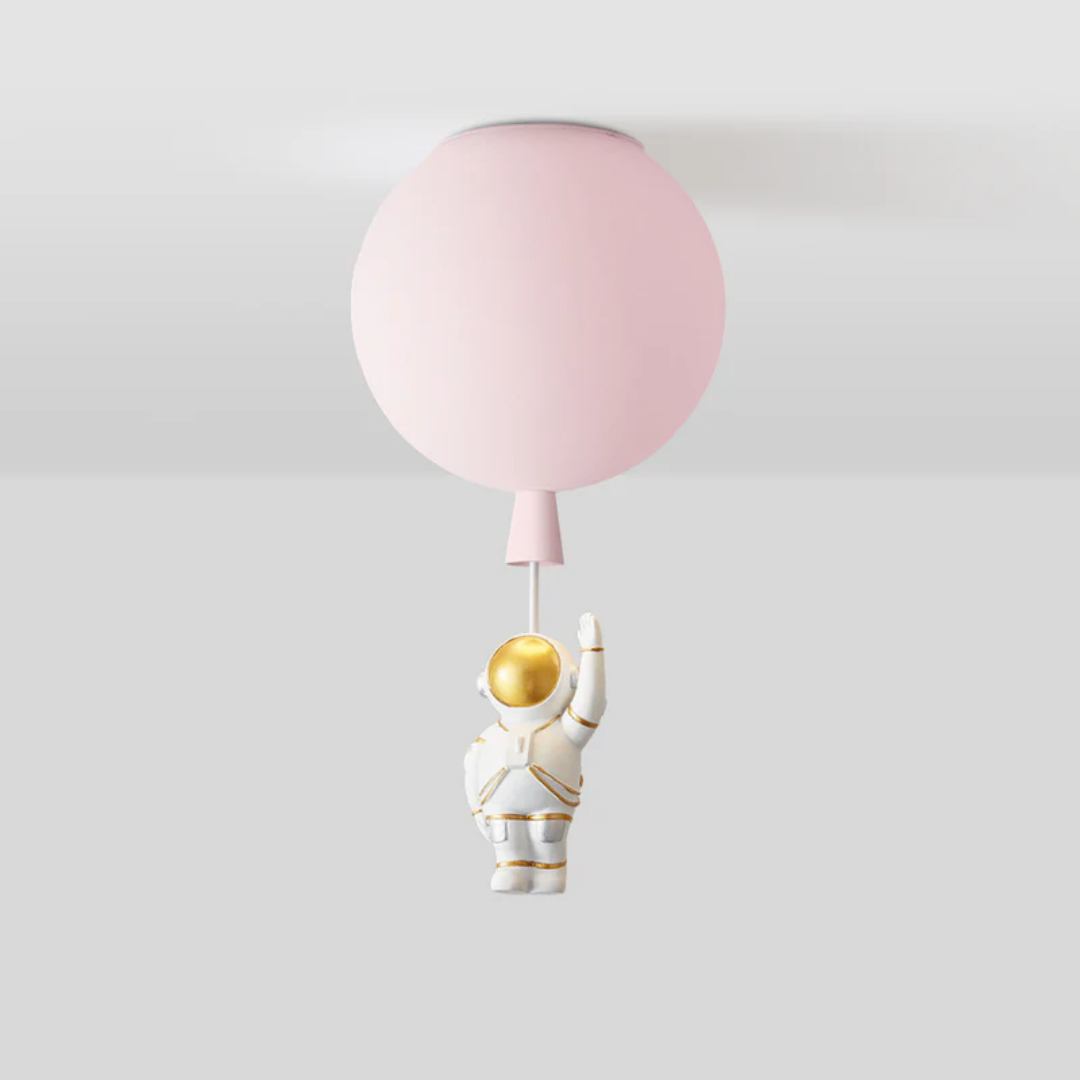 Detailed close up of the astronaut figure on moon ceiling lamp