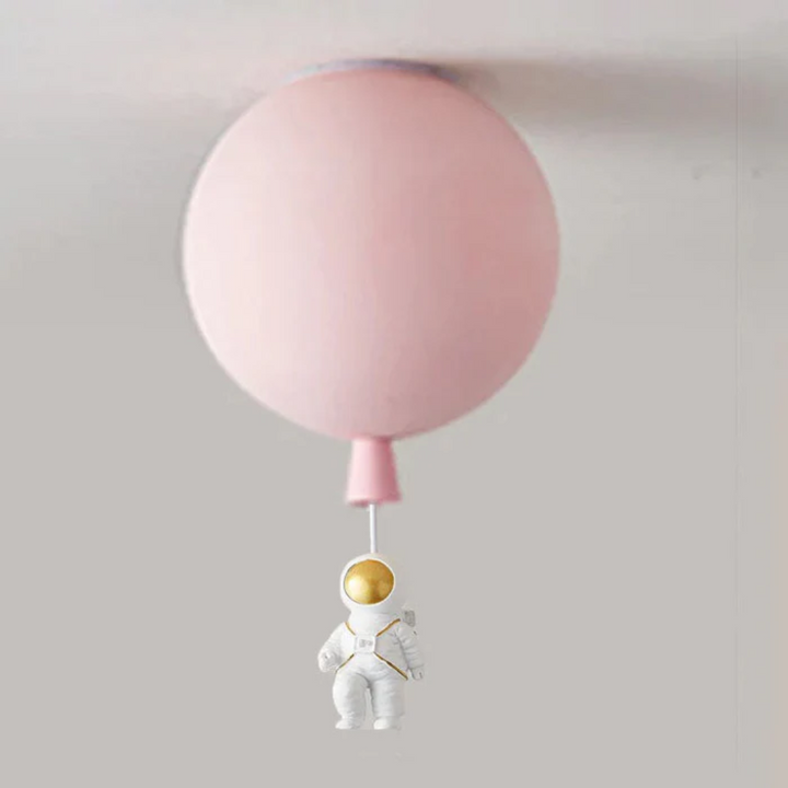 Bright LED ceiling fixture shaped like a moon with little astronaut