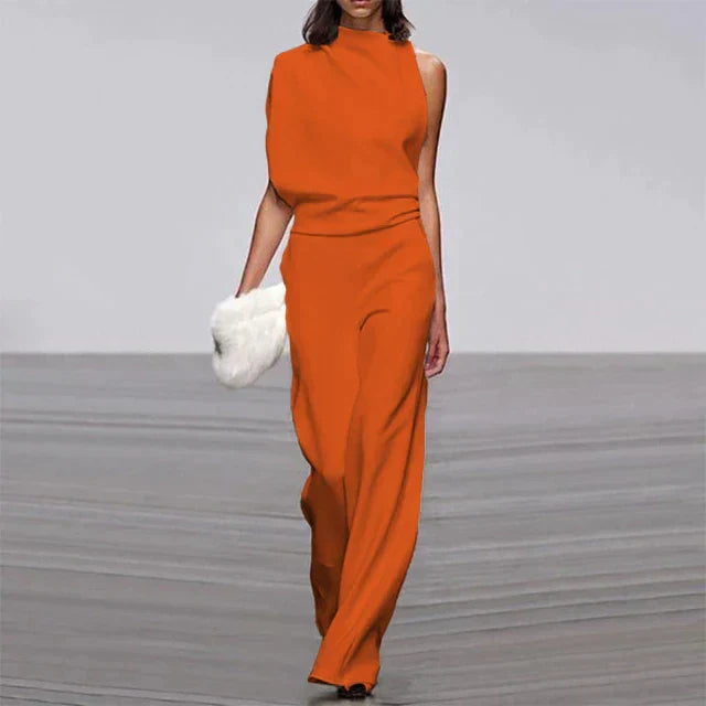 Woman modeling vibrant orange sleeveless wide-leg summer jumpsuit