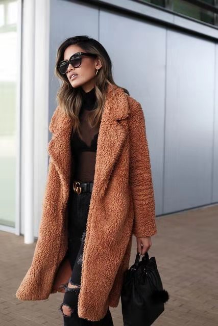 Collar and lapel detail on stylish women's fluffy teddy coat