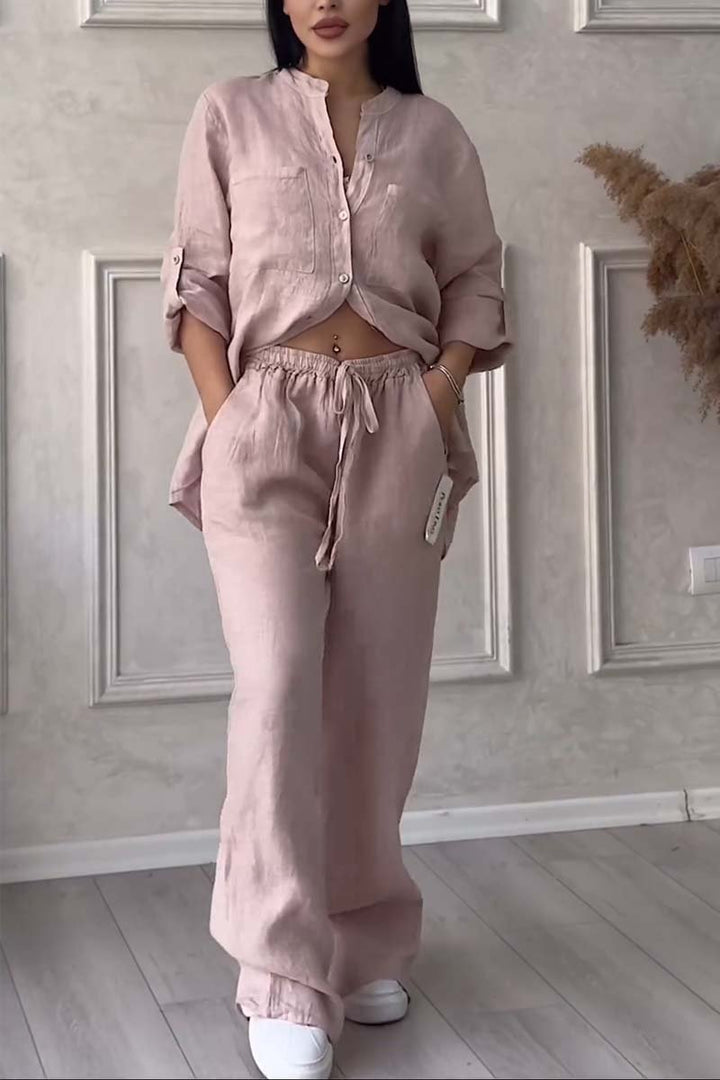Women's relaxed summer two-piece linen blouse and wide trousers outfit