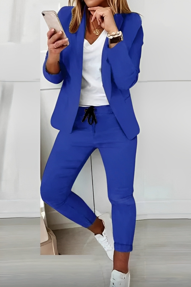 Casual two piece suit for women featuring a stylish blazer and matching trousers