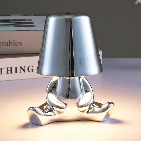 Close up of touch dimming control on unique LED table lamp