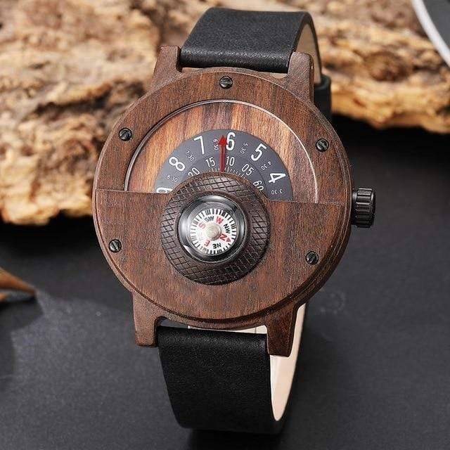Close-up of the walnut wood turntable compass dial watch with black band