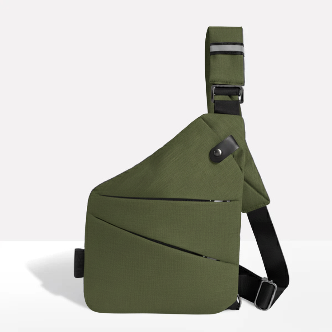 Flat lay of the secure crossbody bag showing all compartments and accessory pockets open