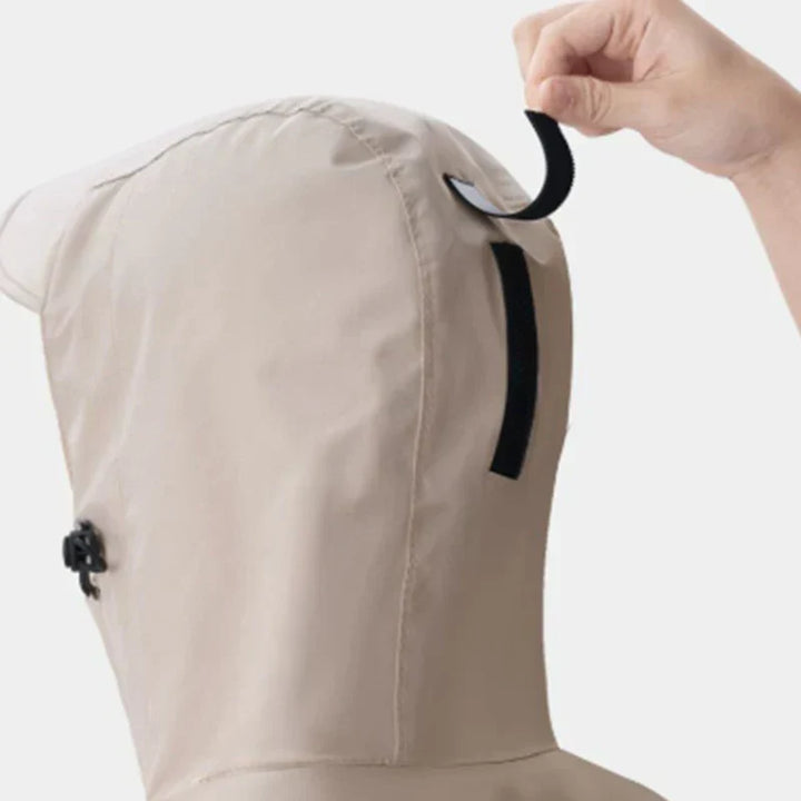 Flat lay of the lightweight outdoor gear rain poncho ready for travel