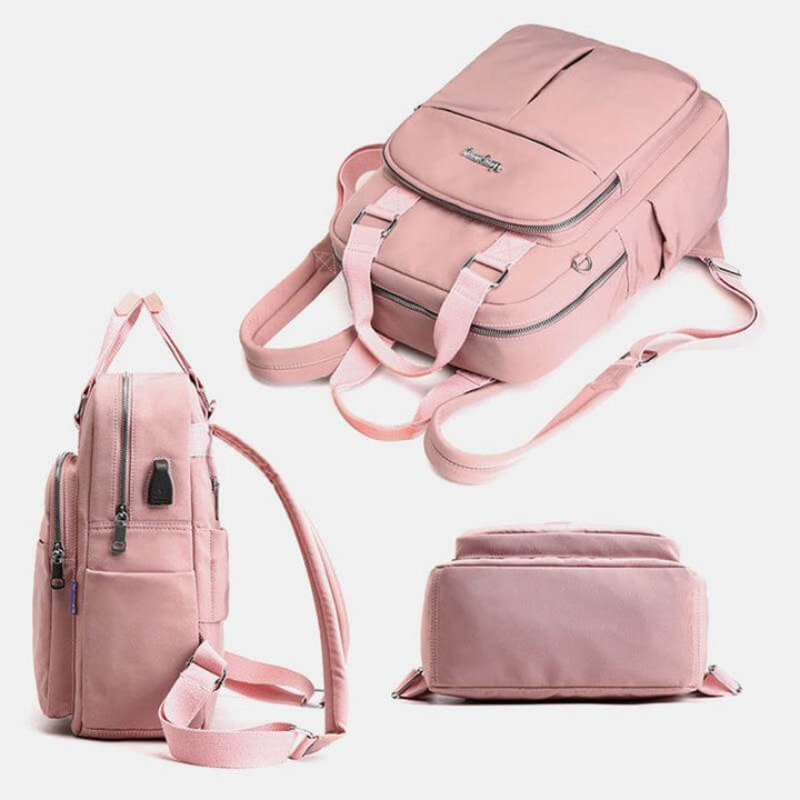 Travel backpack organized with multiple compartments for accessories