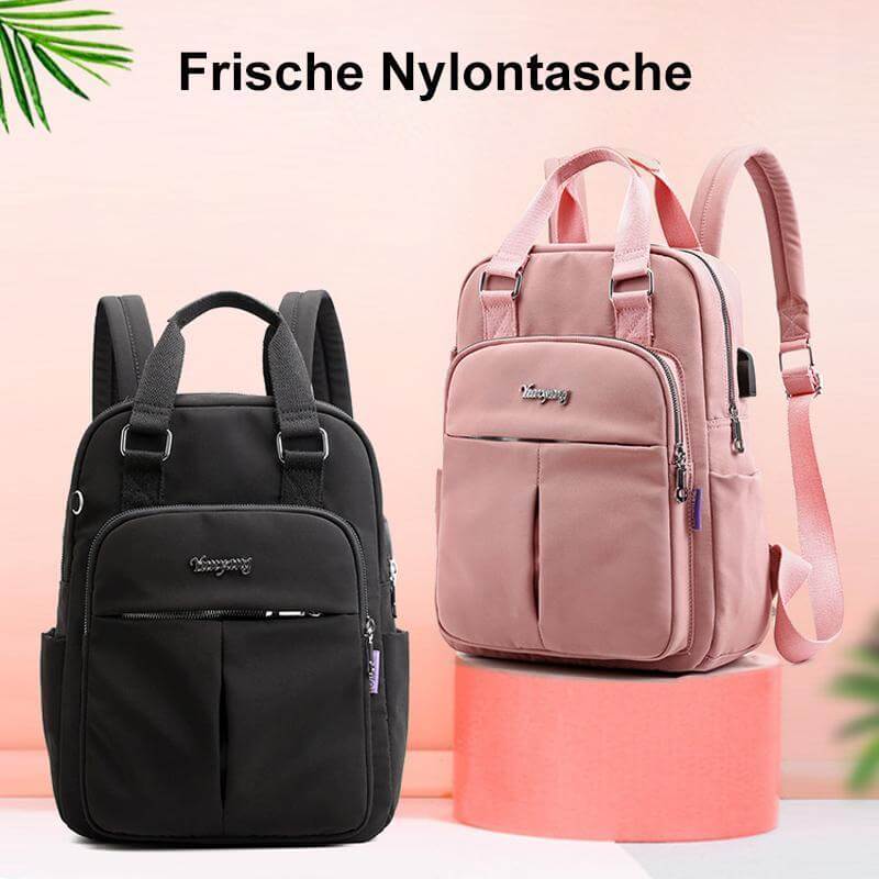 Waterproof laptop backpack side view showing USB charging port and pocket