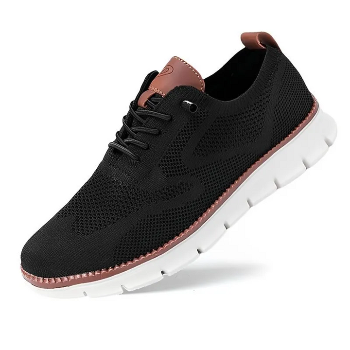 Black variant of the men's urban orthopedic comfort shoe angled on white background