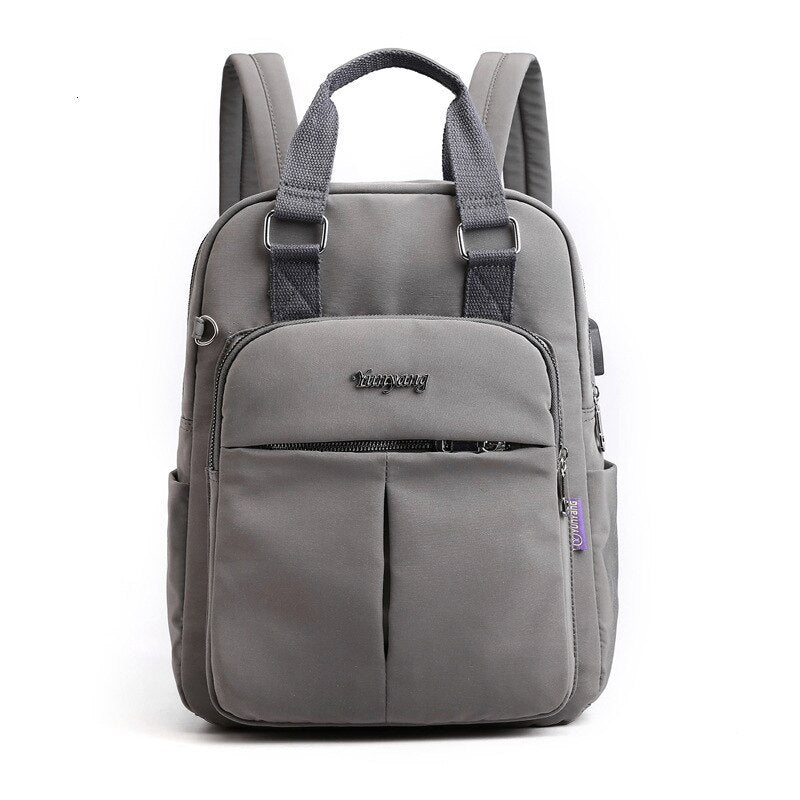 Back view of the unisex travel laptop bag highlighting breathable padded shoulder straps