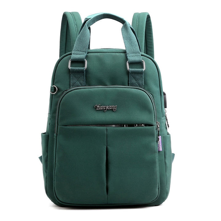Top view of the anti-theft backpack showing sturdy handle and dual zipper access