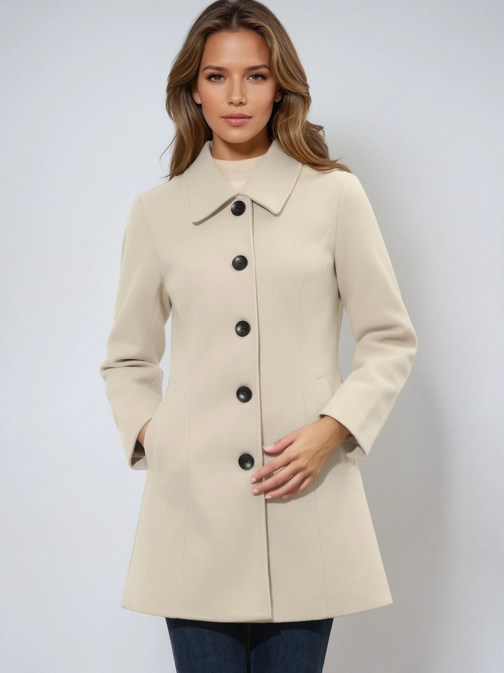 Close-up of trench coat fabric and quality button detail