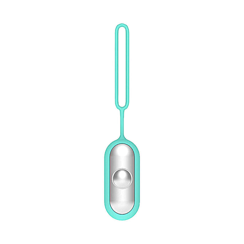 Portable handheld anxiety relief device with included accessories laid flat.