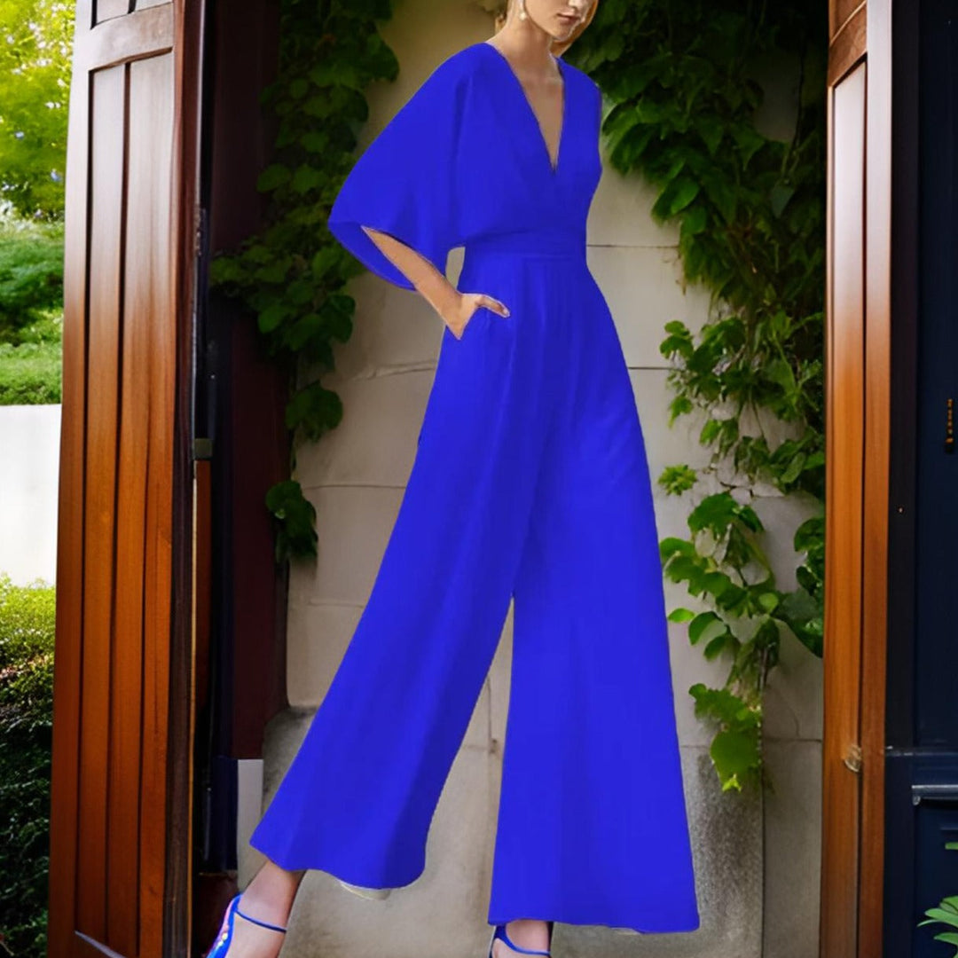 Elegant women's V-neck jumpsuit with three-quarter sleeves from side angle