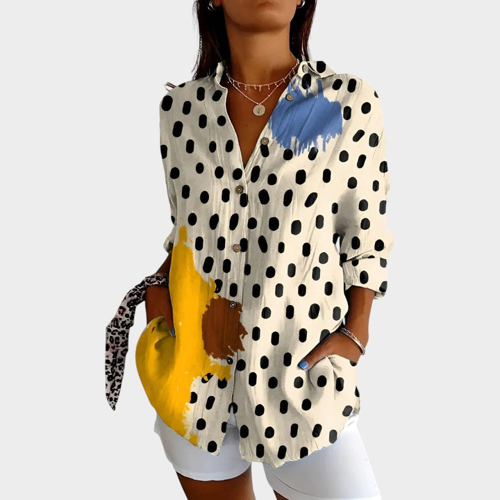 Full view of women's printed shirt styled as versatile workwear and everyday apparel