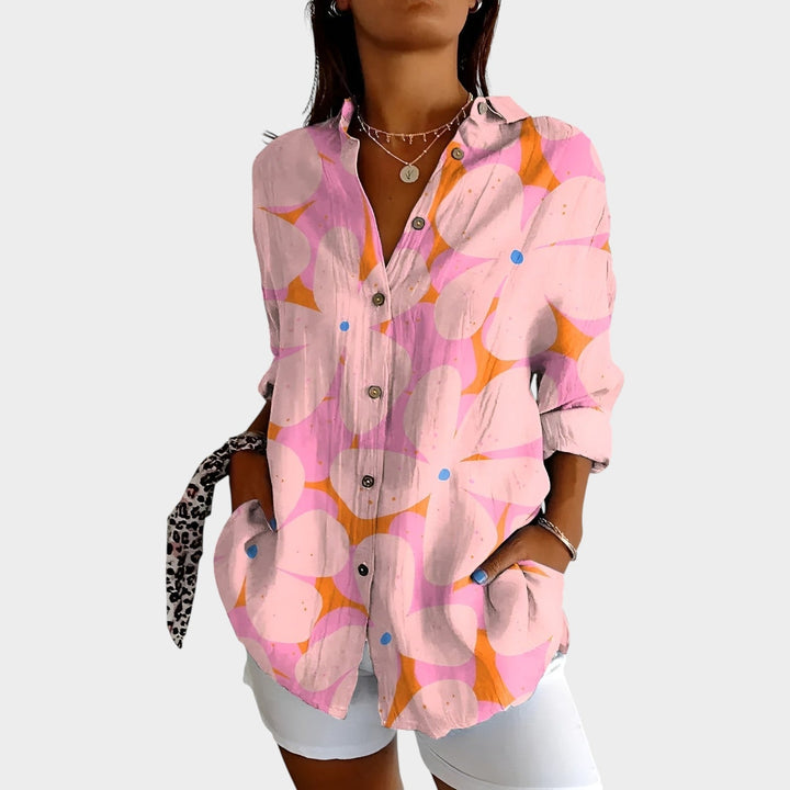 Close up of patterned fabric on women's long sleeve top for workwear and daily styling