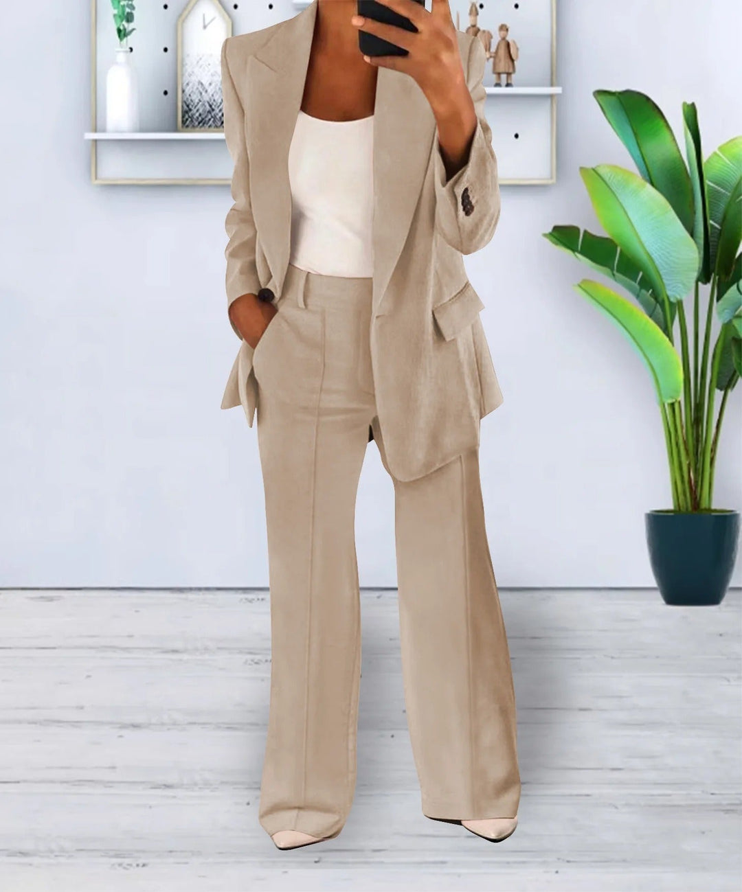 Elegant two piece office wear outfit featuring a structured blazer and trousers