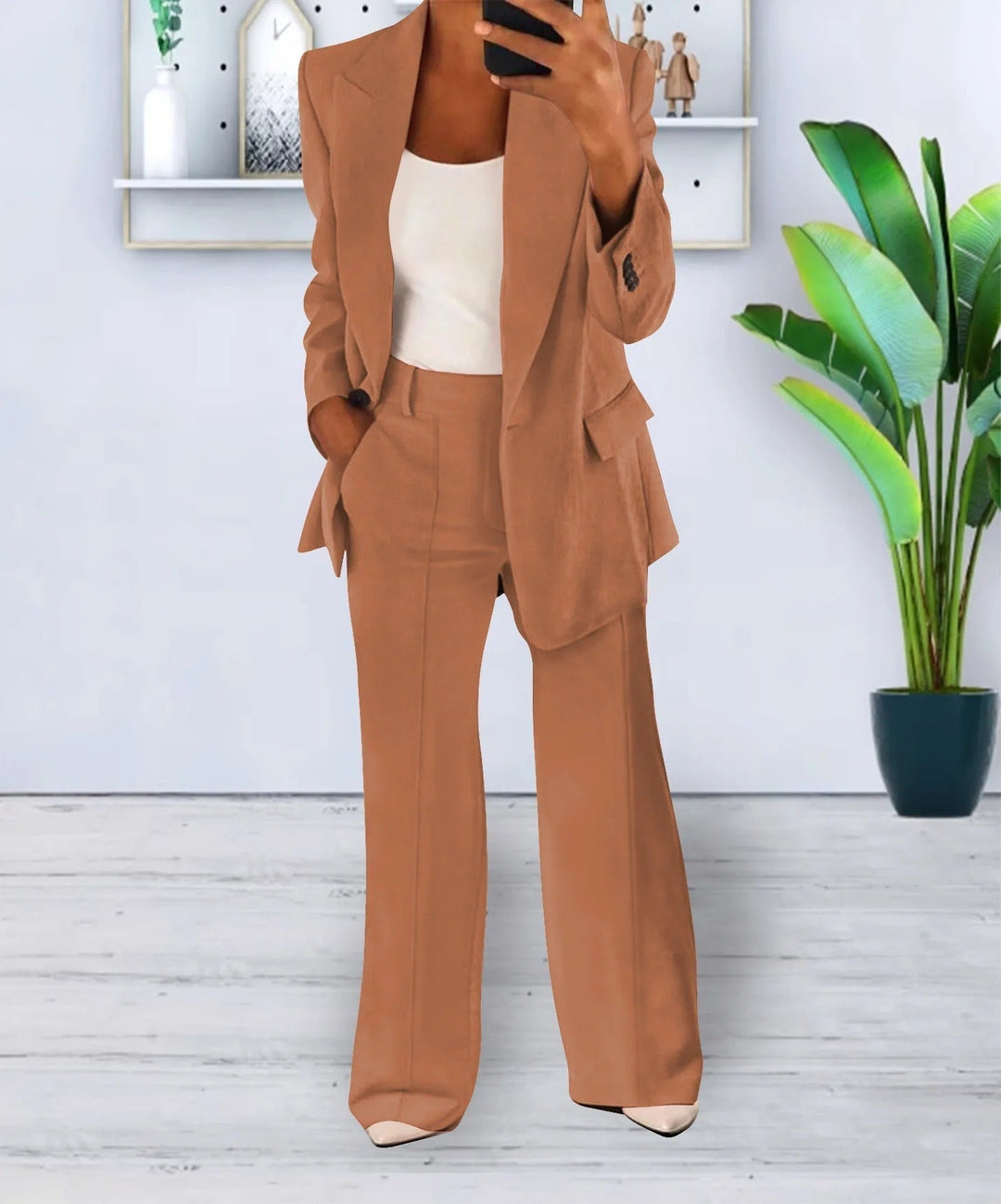 Stylish womens pant suit with a classic blazer and comfortable wide leg pants