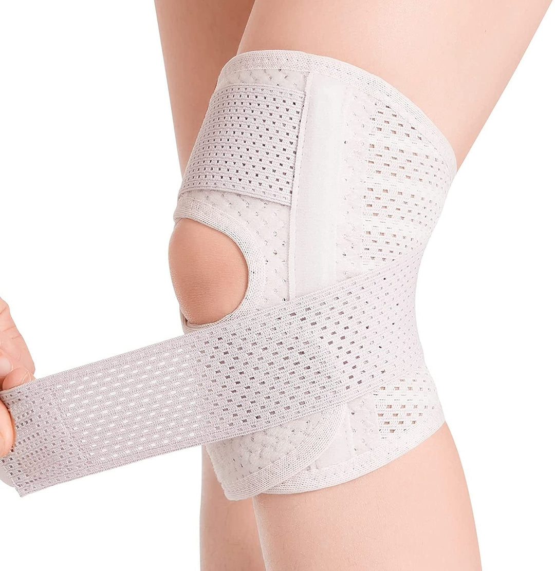 Fitness equipment unisex knee support brace laid flat showing velcro strap