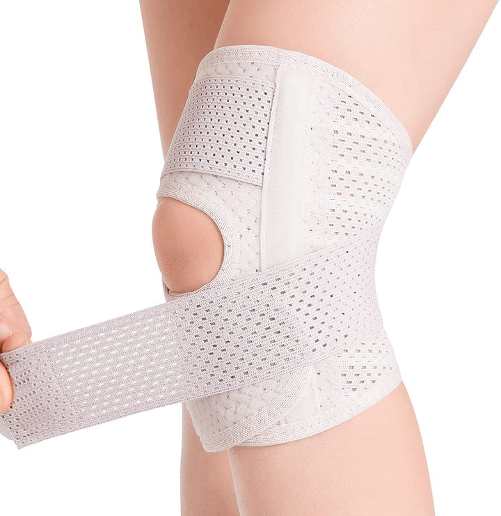 Fitness equipment unisex knee support brace laid flat showing velcro strap
