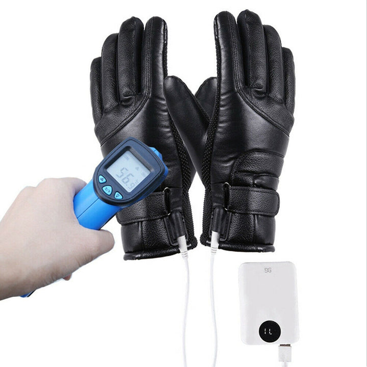 USB rechargeable heated gloves connected to power bank showing temperature reading