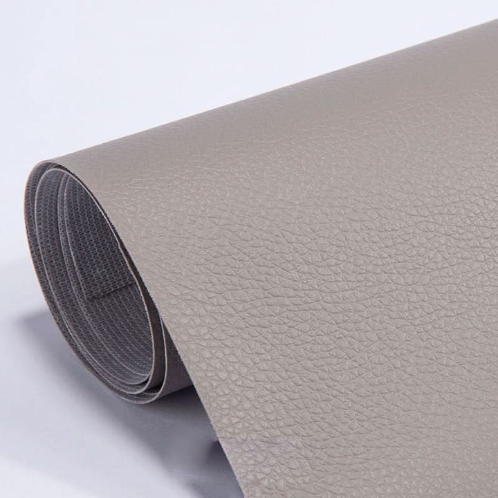 Complete leather patch kit accessories including scissors and adhesive backing