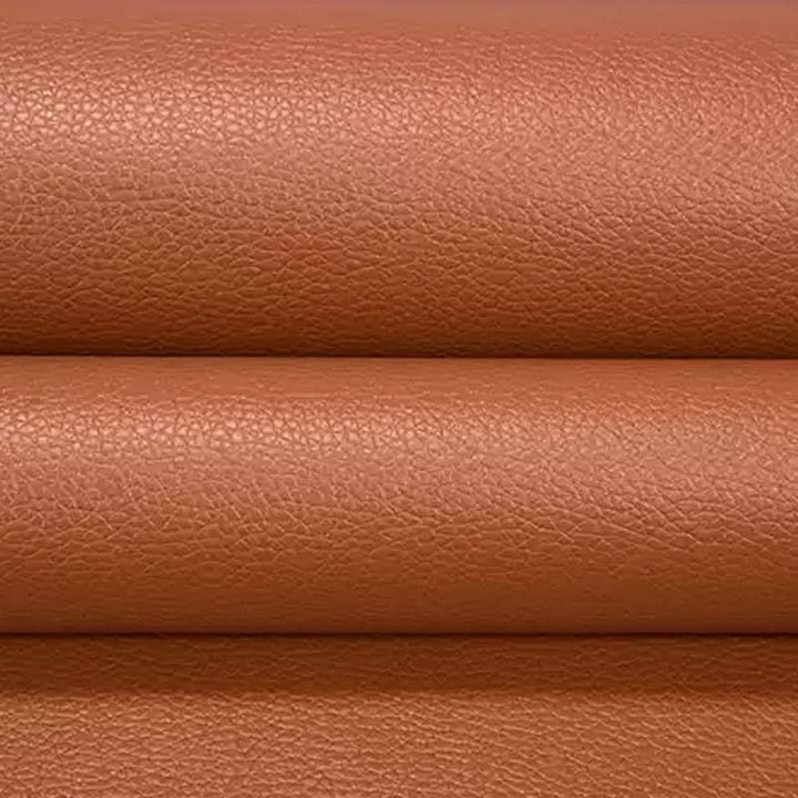 Self-adhesive leather repair patch showing strong adhesive backing and peel-and-stick layer