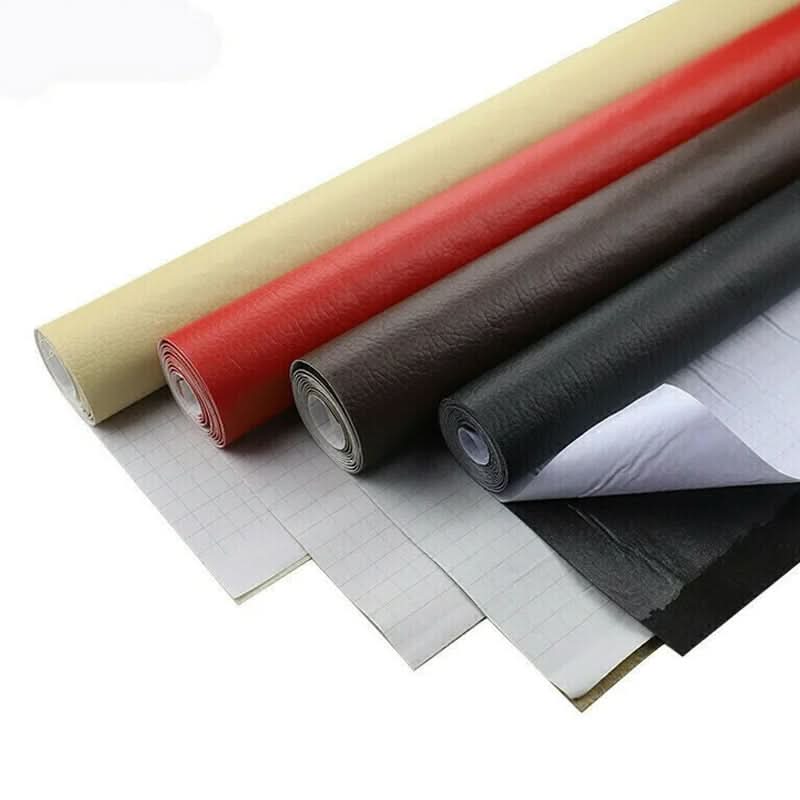 Close-up of flexible self-adhesive vinyl material demonstrating tear resistance