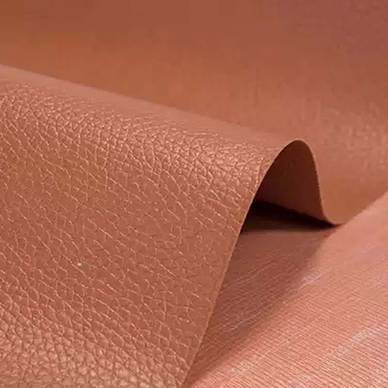 Detailed view of the textured grain on the self-adhesive leather patch