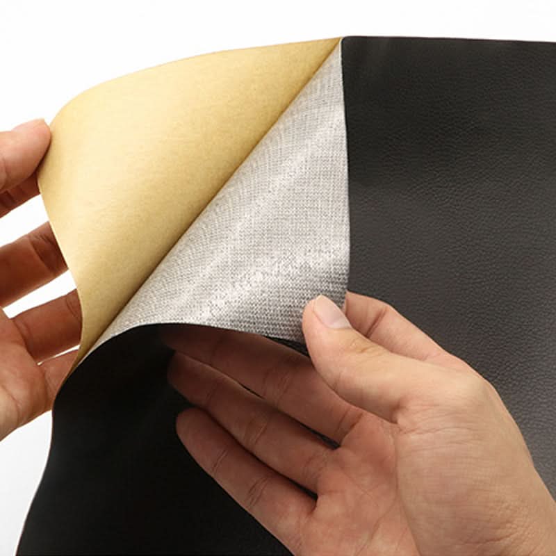 Durable vinyl patch applied to a damaged car seat repair area for seamless blending