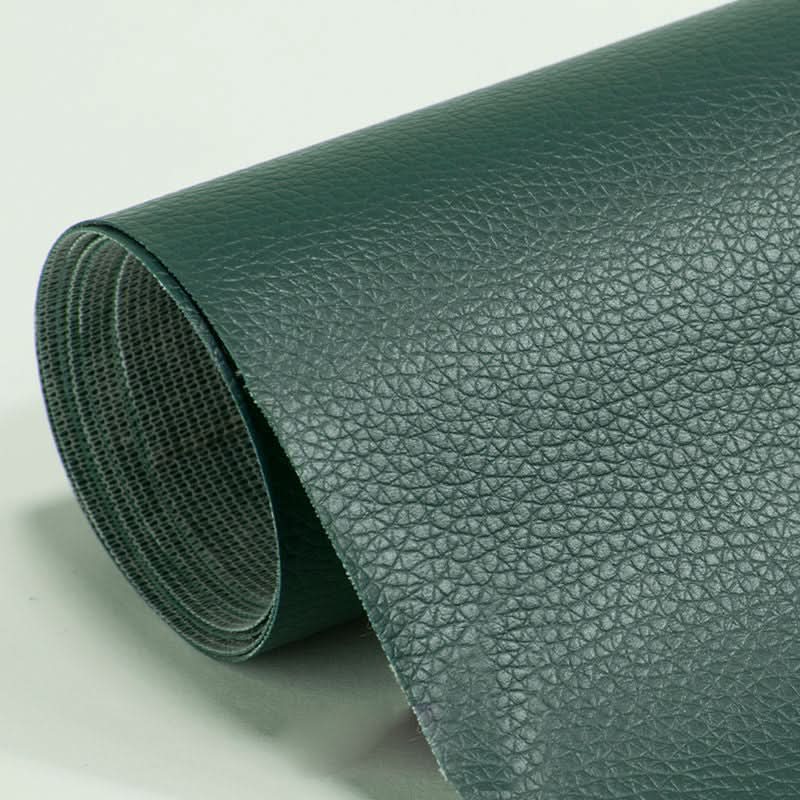 Textured vinyl patch blending seamlessly with textured leather jacket surface