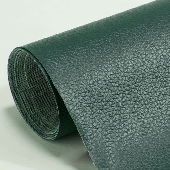 Textured vinyl patch blending seamlessly with textured leather jacket surface