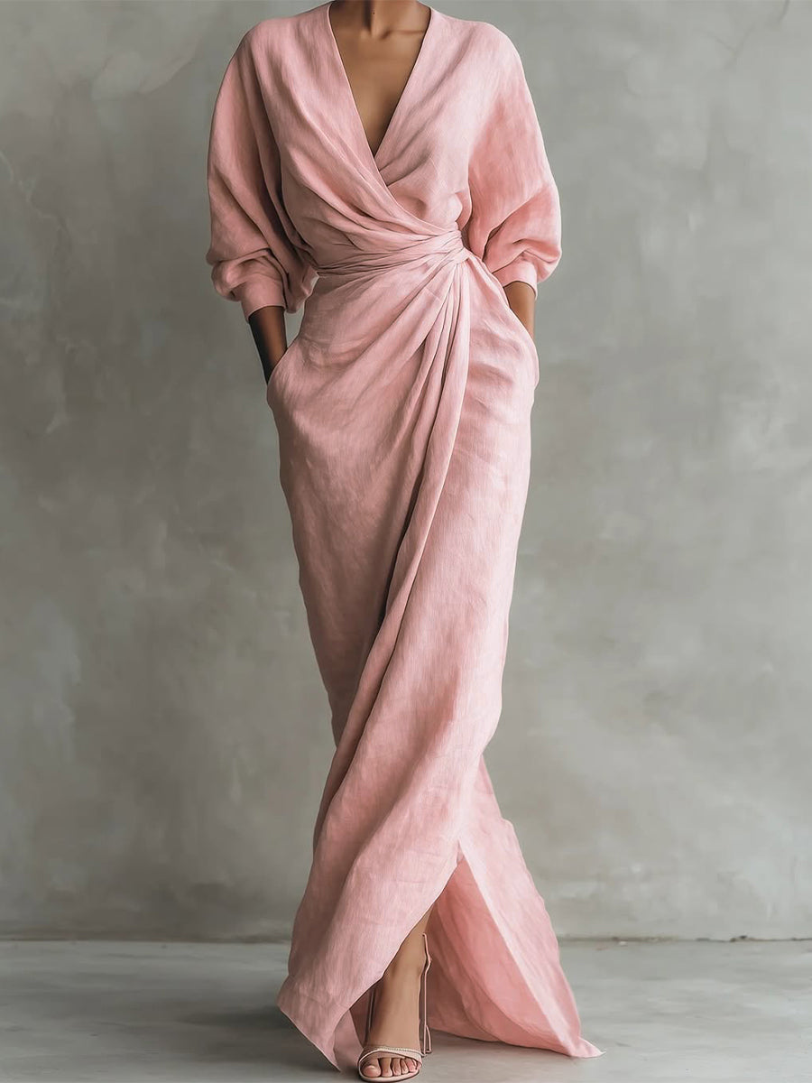 Model wearing the pink wrap maxi party dress with long flowing skirt