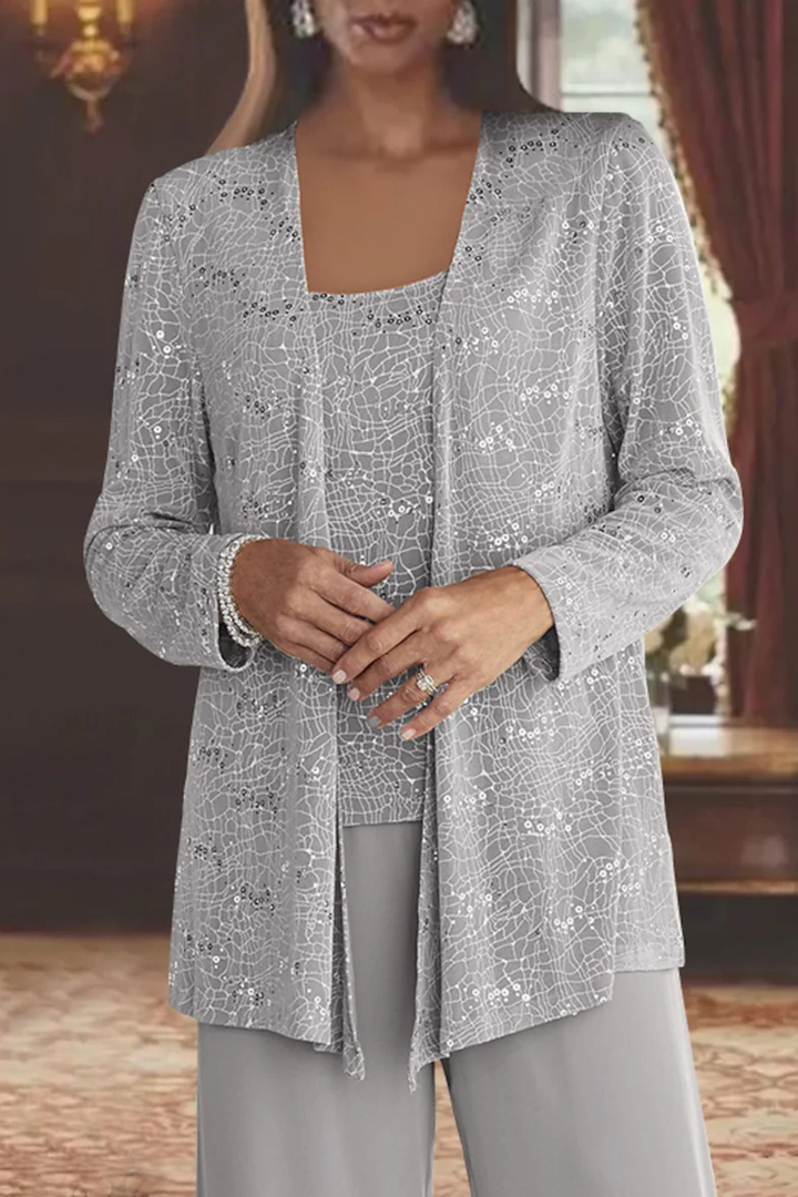 Close-up detail of the sparkling sequin jacket and square neck camisole