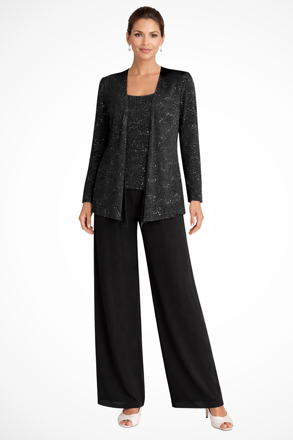 Side angle of sparkly sequin pant set featuring wide leg trousers and matching top