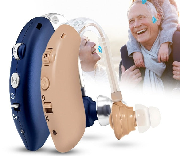 Close-up of blue and beige behind-the-ear sound amplifiers with silicone ear tips and controls
